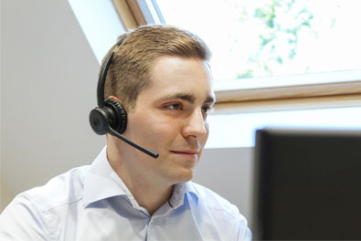 A person wearing headphonesDescription automatically generated with medium confidence